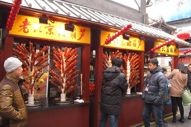 4~5 hours Layover Night trip in Beijing With English Driver - Stop 3: Qianmen Main Street Mall—snacks, shopping, and street energy