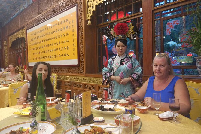 Beijing Imperial Dining Experience at Bai Jia Da Yuan Restaurant with Houhai Lake Bar Tour - Night drive around lit Beijing: landmarks, pacing, and photo timing