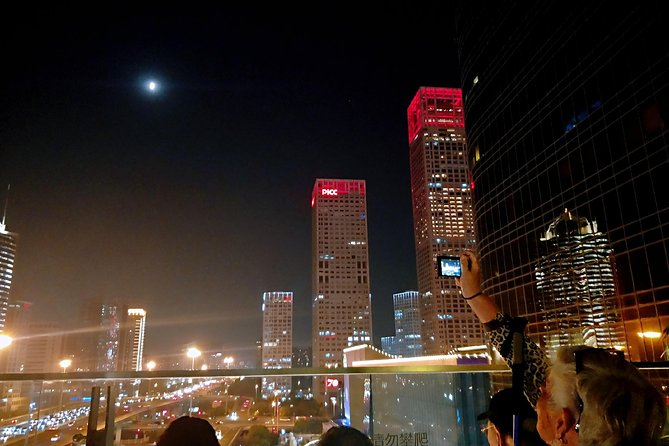 Beijing: Private Layover Tour with Optional Duration - Qianmen Street at night: classic lanes with modern shopping energy