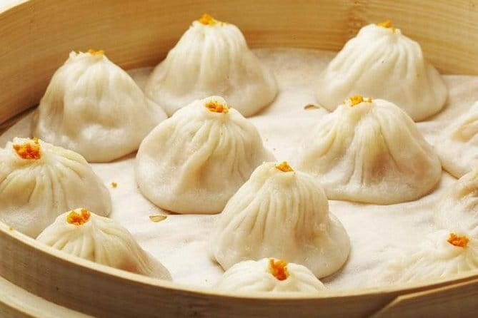 Din Tai Fung Dinner and VIP Class River Cruise Experience in Shanghai - Getting started: central hotel pickup and a guided evening game plan