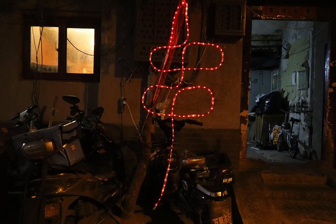 Imperial Beijing Central Axis Journey by bike - The Egg at the National Center and Qianmen’s portal glow
