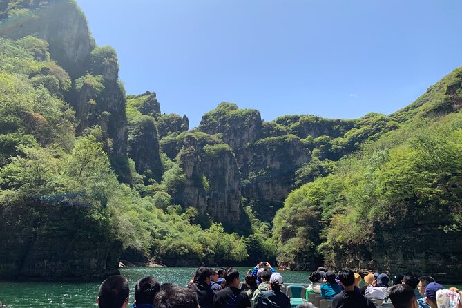 Private Day Tour to Longqing Gorge with Boat Ride and Cable Car from Beijing - The Baili River boat cruise: cliffs, clear water, and a moving viewpoint