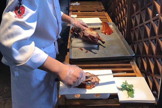 Private Tour to Pearl Market Acrobatic Show & Peking Duck Dinner - 大碗居 Peking duck dinner: what you’ll learn and how the meal is handled